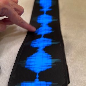 KESEFF.INC NeckTie that lights up/flashes on touch/& to the sound of a beat.